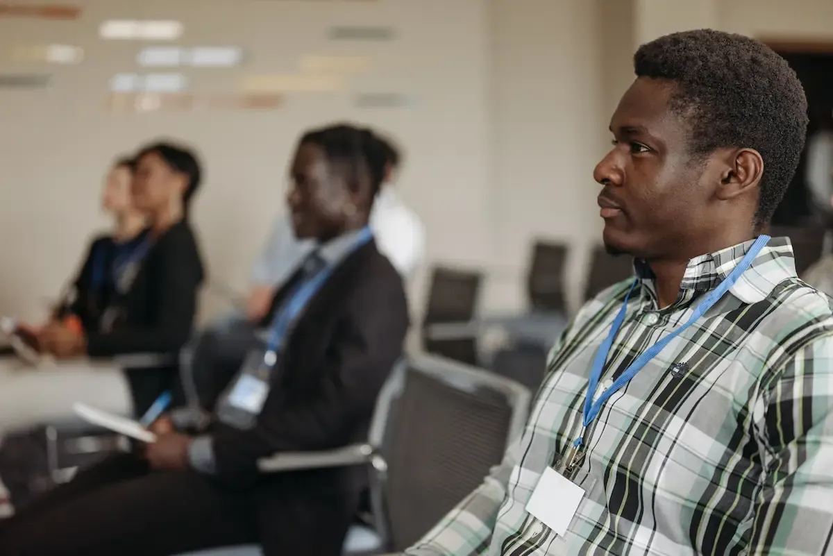 Participants listening during a Bible teaching conference